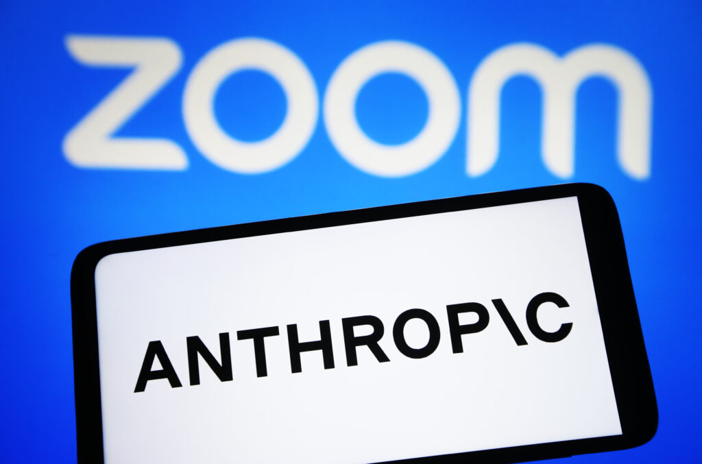 Photo illustration in Ukraine - 16 May 2023 May 16, 2023, Ukraine: In this photo illustration, Anthropic logo is seen on a smartphone and Zoom Video Communications logo on a pc screen. (Credit Image: © Pavlo Gonchar/SOPA Images via ZUMA Press Wire)